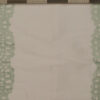 White fabric with mint green floral lace stripe borders