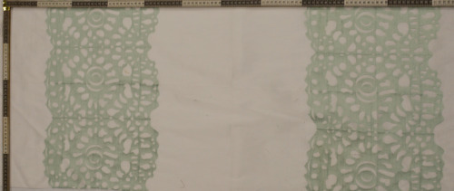 White fabric with mint green floral lace stripe borders
