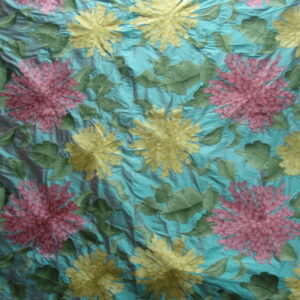 Bold Floral Print on Teal Fabric